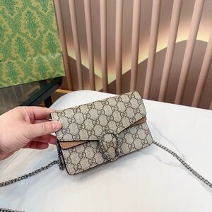 Gucci Beige Monogram Clutch with Chain